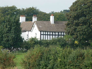 A photo of the listed Old Hall Farm, Old Hall Lane.